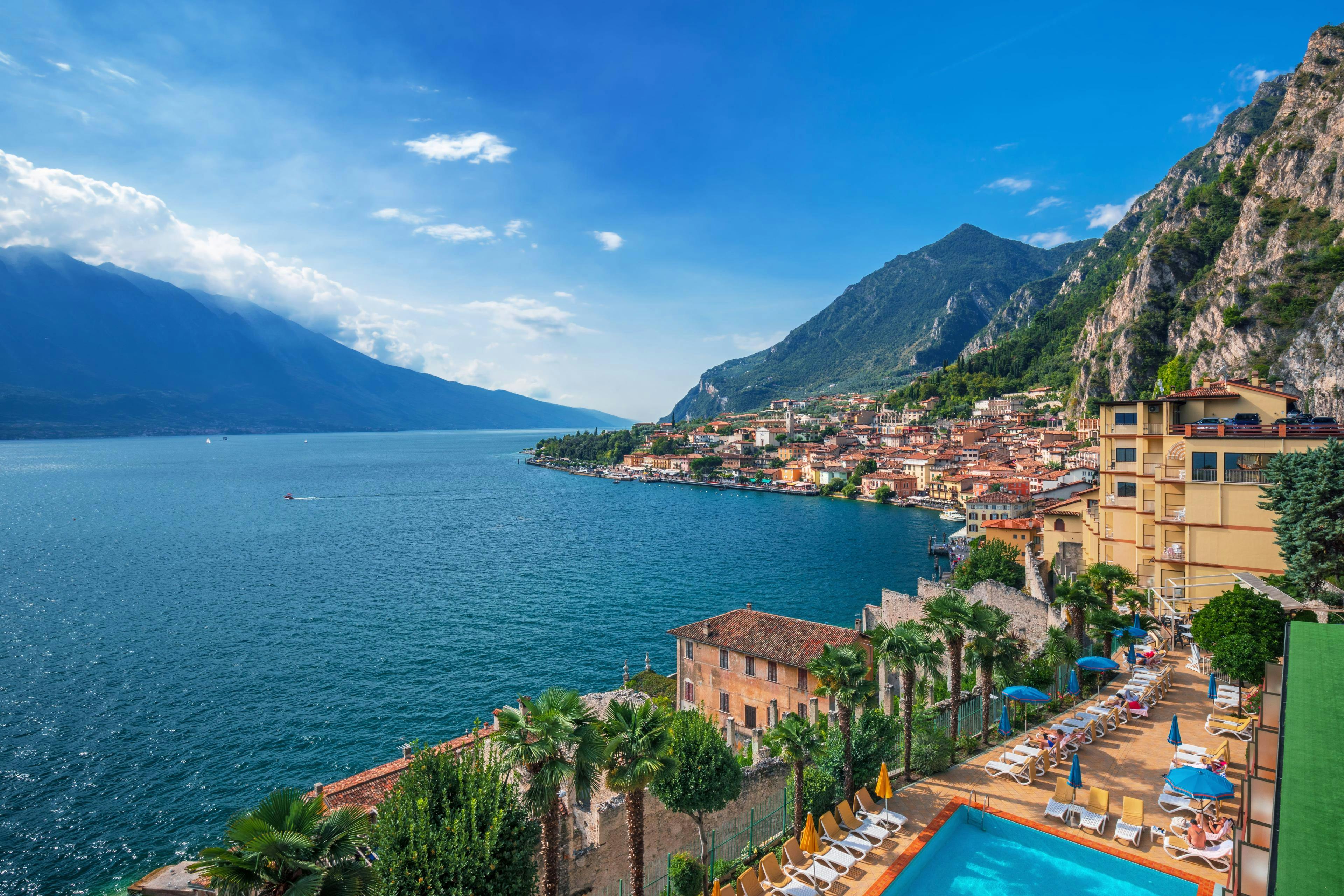 An image of the beautiful Lake Garda in Northern Italy, the perfect spot to book a boat trip in summer.