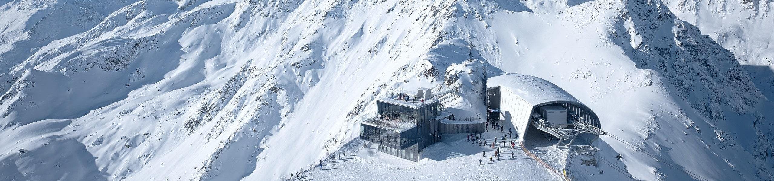 A bird's-eye view of the Gaislachkogl mountain gondola in the ski resort of Sölden, where local ski schools offer a broad range of ski lessons.